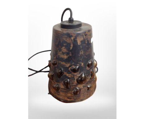 A 1970s Scandinavian amber glass conical light fitting with metal overlay, height 23cm excluding fitting.