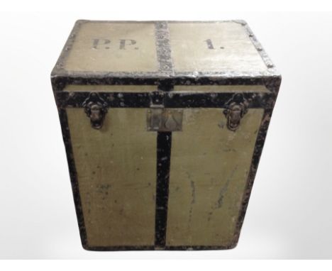 An early 20th-century canvas and metal-mounted shipping trunk, 72cm x 55cm x 40cm.