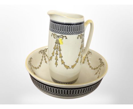 A 19th-century Royal Doulton pottery wash jug and basin.
