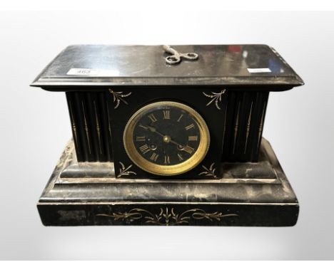 A 19th-century slate mantel clock, height 21cm.