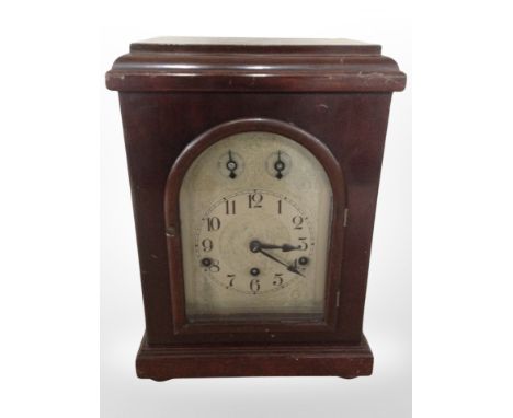 A Westminster chime mantel clock with silvered dial, height 37cm.