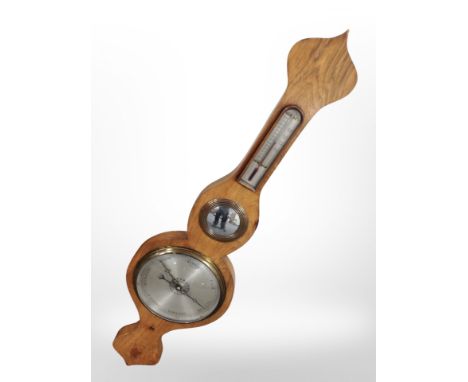 A banjo barometer with silvered dial, height 95cm.