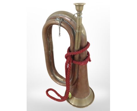 A brass and copper bugle.