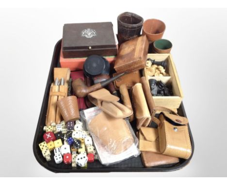 A group of collectables including boxwood chess set, pipes, leather pouches, pens, dice, etc.