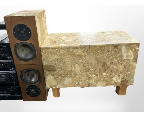 A Danish marble speaker stand, width 60cm, and a similar pair of speakers.