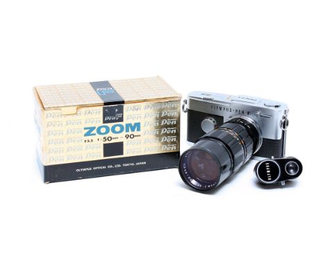An Olympus Pen F Camera, with f/3.5 50-90mm lens 