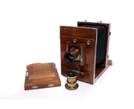 An Unmarked Continental Tailboard Camera, with two brass lenses and one DDS