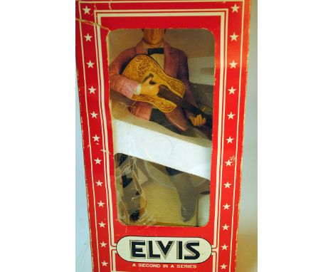 Elvis Presley,  A McCormick Distilling Co, Exclusive Limited Edition A Portrait Of Elvis decanter, in original box with conte