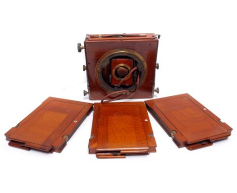 A British-made Mahogany Field Camera, with three DDS