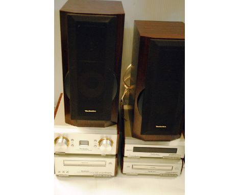 Technics Stereo System, Model SF-HD560 tuner, amplifier, CD player, cassette deck, wood grain speakers, untested