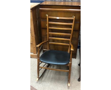 STAINED WOOD LADDER BACK ROCKING CHAIR, along with a walnut chest of drawers (2)