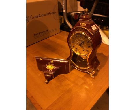 REPRODUCTION ELUXA LACQUERED AND GILT BRACKET CLOCK, with bracket, along with an Italian circular wall clock (2)