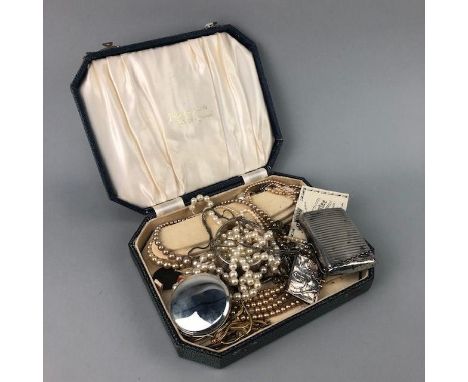 EARLY 20TH CENTURY SILVER BANGLE, along with simulated pearl necklaces, a silver purse and other jewellery