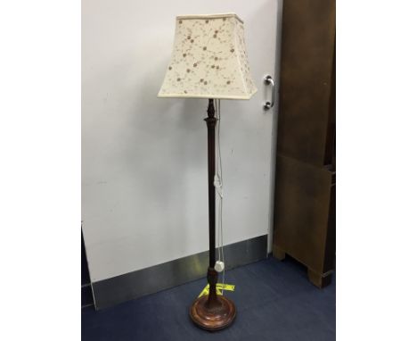 MAHOGANY STANDARD LAMP, the fluted pillar over a circular base, with shade
