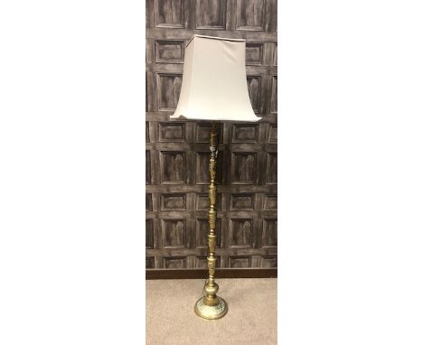 BRASS STANDARD LAMP, along with cream shade, 175cm high