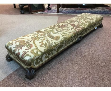 FENDER STOOL, upholstered with foliage, 122cm long