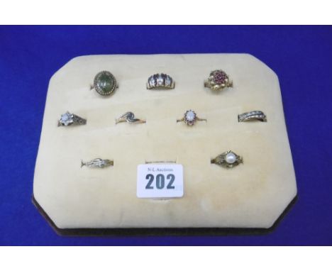 EIGHT ASSORTED GOLD RING AND A YELLOW METAL RING INCLUDING A 9CT GOLD RUBY & DIAMOND RING, 18CT GOLD RING, 9CT OPAL AND DIAMO