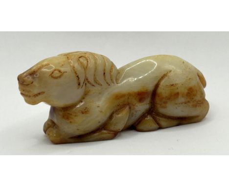 A Chinese mottled stone figure of a horse, 9 cm wide