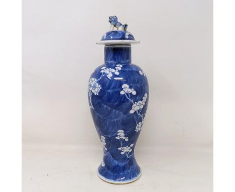 A Chinese vase and cover, four character mark to base, 32 cmfinial repaired, some chips