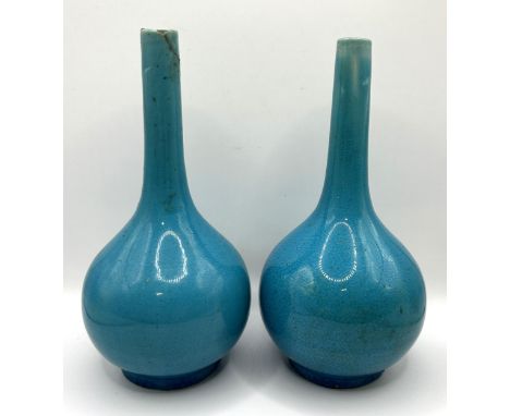 A pair of Chinese turquoise glazed bottle vases, 13 cm high (2)Small losses on both