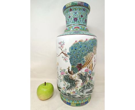 A Chinese famille rose vase, of cylindrical form, decorated a peacock, character mark to base, 43 cm high