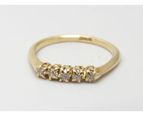 An 18ct gold five stone diamond ring, 1.8g, L