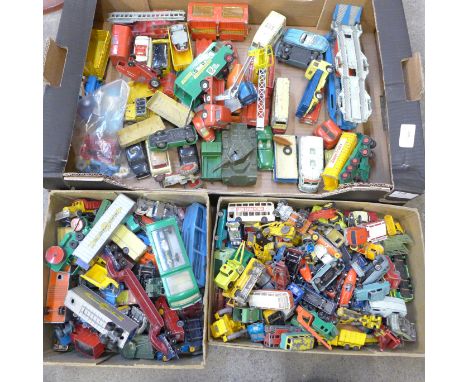 A collection of die-cast model vehicles including early Dinky, Corgi, Matchbox, etc., playworn