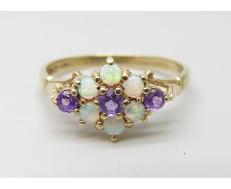 A 9ct gold, opal and amethyst cluster ring, 2.2g, R