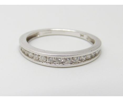 A 9ct white gold diamond set half eternity ring, 2g, N