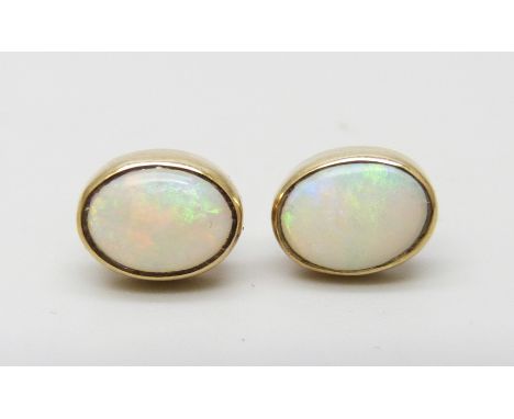 A pair of 9ct gold and opal earrings, 1.6g