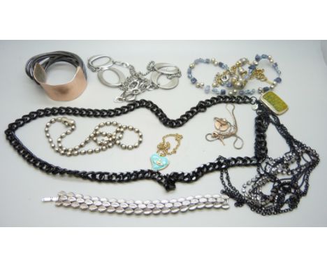 A collection of designer jewellery including Vivienne Westwood, Trifari, Fossil, Corocraft, etc.