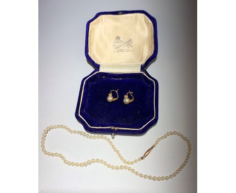 A child's graduated pearl necklace with 9ct gold barrel clasp signed 'Ciro' and a pair of simulated pearl earrings. (Qty: 1)