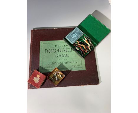 A Cardora Series (Johillco) 'The New Dog-Racing Game', an early board game together with a tobacco tin containing six differe