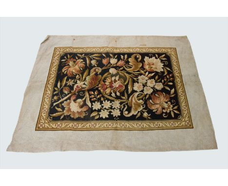 A woolwork tapestry panel of floral design. (Dimensions: Overall size 112cm x 149cm,&nbsp; tapestry&nbsp;79.5cm x 116cm.) (Qt
