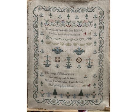 An 19th century needlework sampler, embroidered with text 'Take time in time while time doth last...', and baskets of flowers