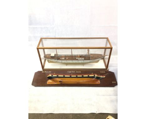 A scale model of a three masted sailing ship, in boatyard style, perspex case together with a half block model of Repulse, bo