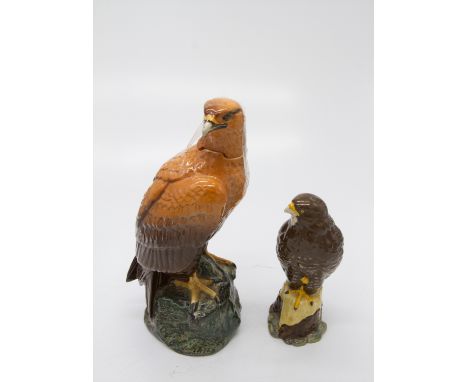 A Royal Doulton Whyte &amp; Mackay Golden Eagle decanter and a similar whisky buzzard decanter, unopened.