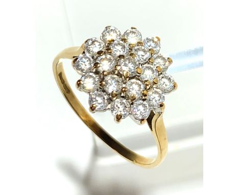 An 18ct white gold diamond flowerhead cluster ring.