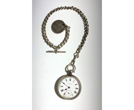 An open face key wind silver cased pocket watch, signed A Carver patent lever on silver chain with faceted links and with Vic