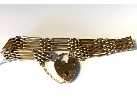 A four bar gate linked 9ct bracelet.
