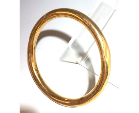 A 9ct gold bangle, 18gm.