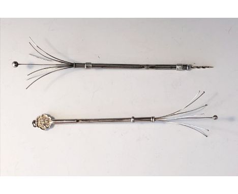 A Chinese silver propelling swizzle stick together with a double ended propelling swizzle stick and cigar piercer.