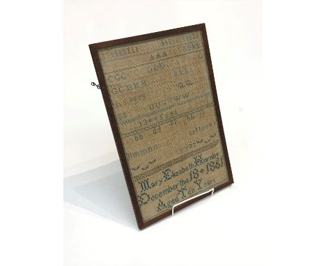 A 19th century needlework alphabet sampler, worked by Mary Elizabeth Hornby aged 10, dated December 18 1861. (Dimensions: 44c
