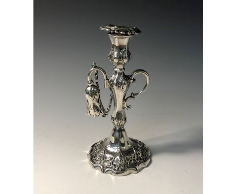 An early Victorian engraved silver taper stick with detachable drip tray and original snuffer in the form of a flower bud, ma