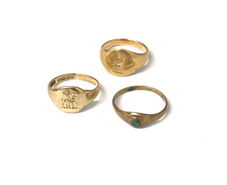 Two gold signet rings and one other ring
