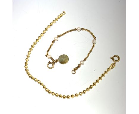 A 9ct. gold chain bracelet with spaced pearls and a 9ct. bracelet with ball links.