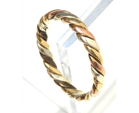 A spiral gold ring.