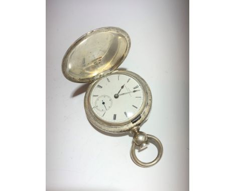 A silver engine turned keyless full hunter cased pocket watch by Miller Springfield Illanois, the movement with patent pinion