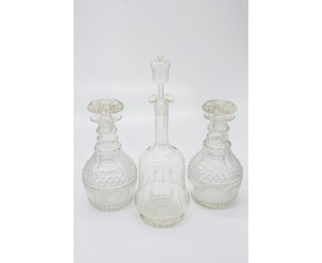 A pair of 19th century triple ring neck decanters, with mushroom stoppers, height 24cm, together with a Victorian decanter an