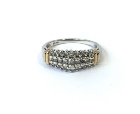 A 10ct gold ring with rows of diamonds.